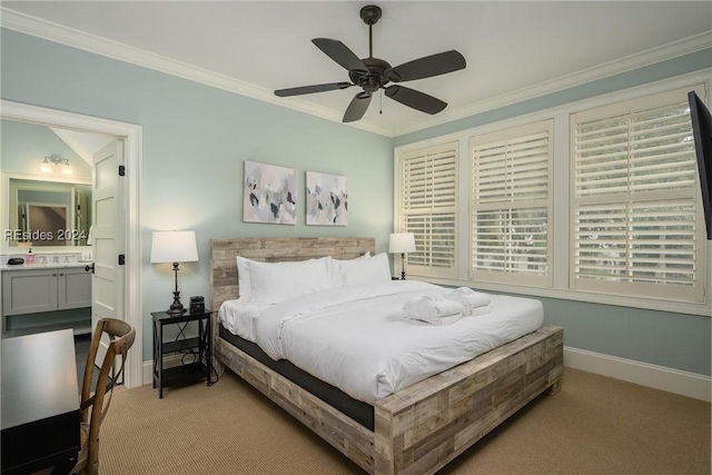 bedroom with ceiling fan, ensuite bath, crown molding, and light colored carpet