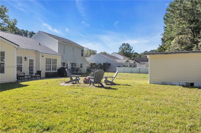 view of yard with an outdoor fire pit