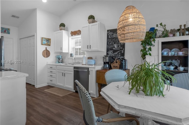 kitchen with sink, decorative light fixtures, dark hardwood / wood-style floors, dishwasher, and white cabinets