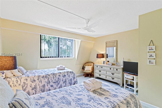 bedroom featuring carpet floors and ceiling fan