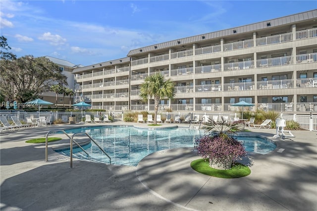 view of pool featuring a patio