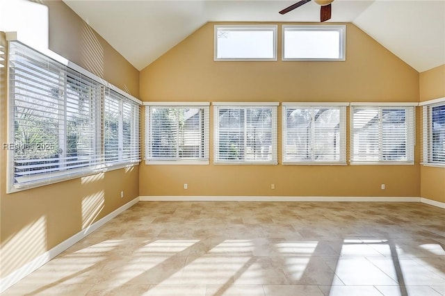 unfurnished sunroom featuring vaulted ceiling and ceiling fan