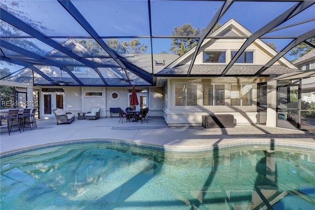 view of pool featuring a patio and a lanai