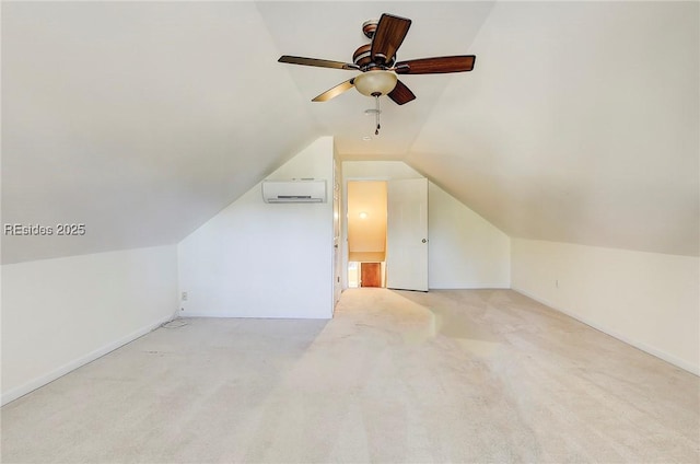 additional living space featuring a wall mounted air conditioner, lofted ceiling, and light carpet