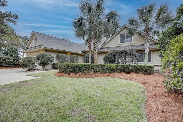 view of front of house with a front lawn