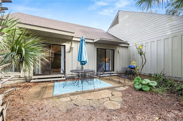 rear view of property featuring a patio area