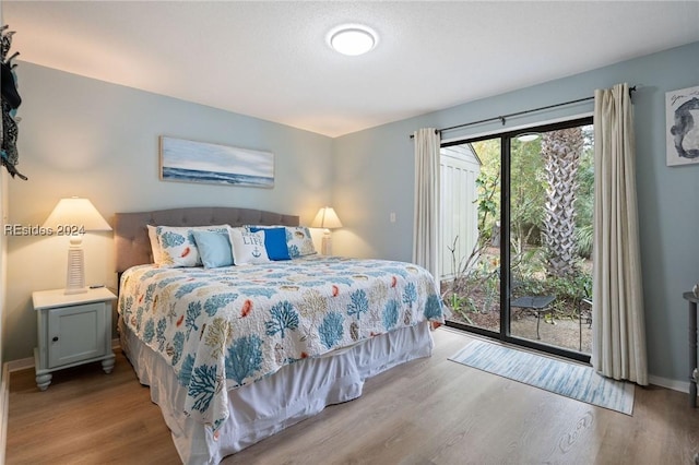 bedroom with light hardwood / wood-style flooring