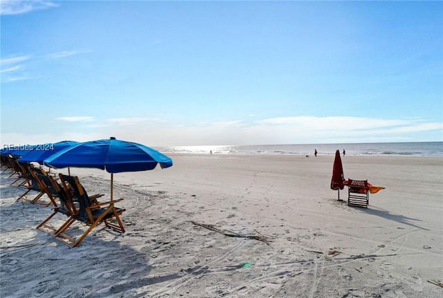 view of community featuring a view of the beach and a water view