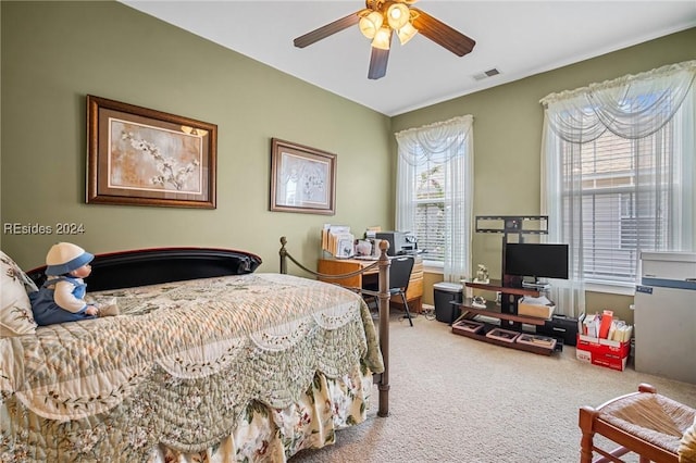 carpeted bedroom featuring ceiling fan