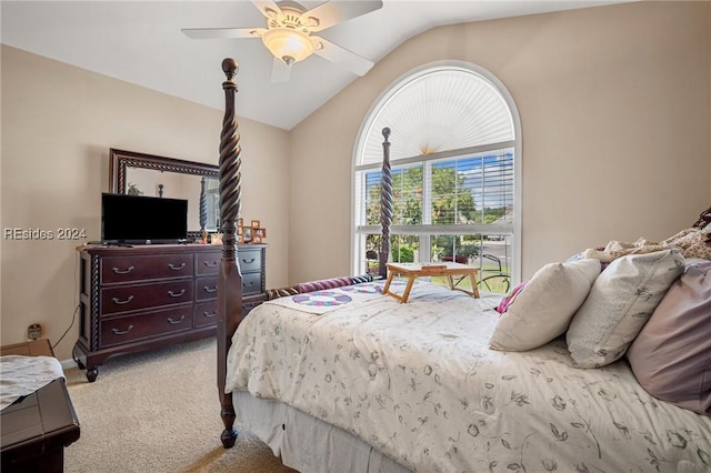 carpeted bedroom with lofted ceiling and ceiling fan