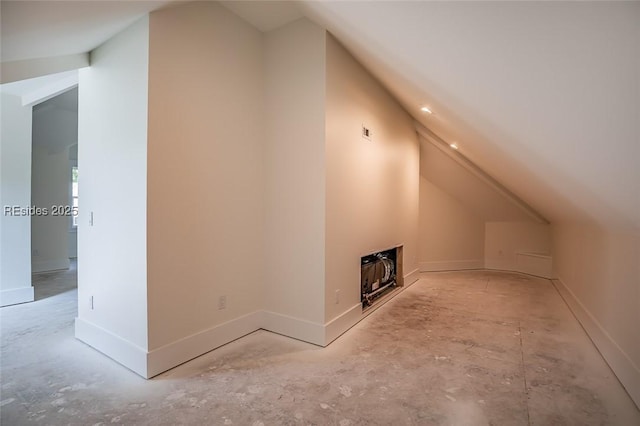 bonus room with vaulted ceiling