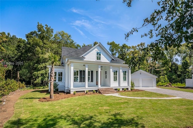 neoclassical / greek revival house with a garage, an outdoor structure, covered porch, and a front lawn