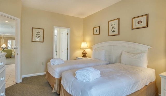 bedroom with light colored carpet