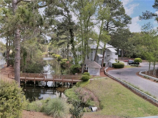 exterior space with a water view