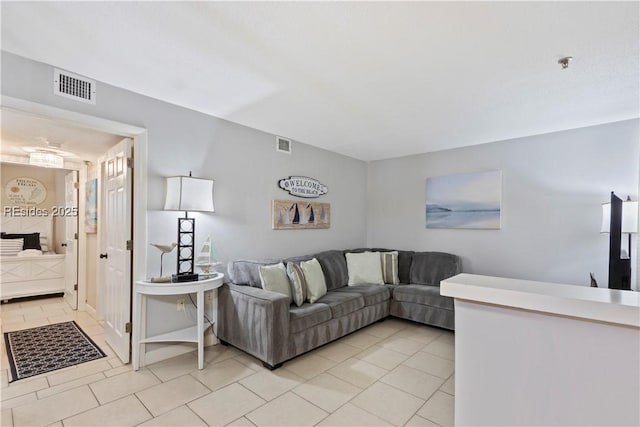 living room featuring light tile patterned floors