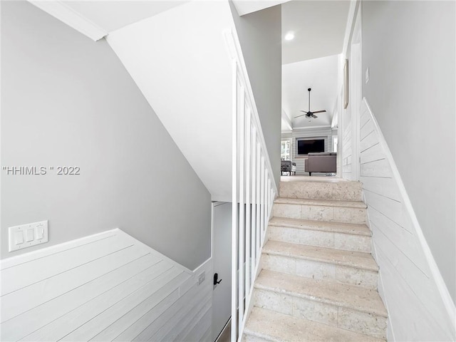 stairs with ceiling fan