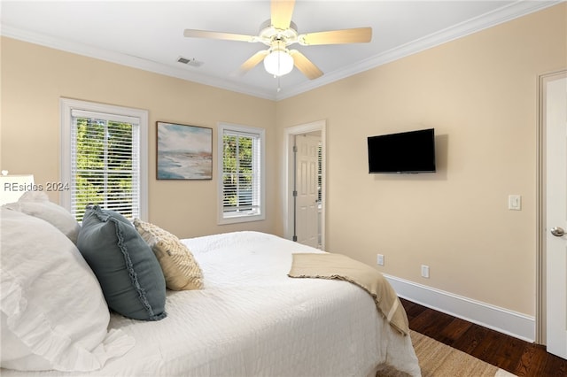 bedroom featuring crown molding, ceiling fan, and hardwood / wood-style flooring