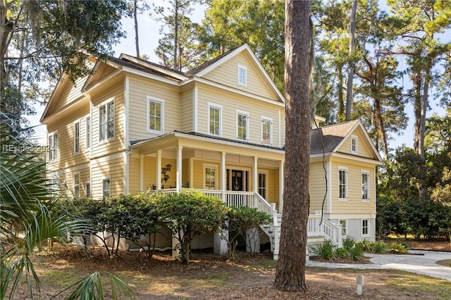 view of front of property featuring covered porch