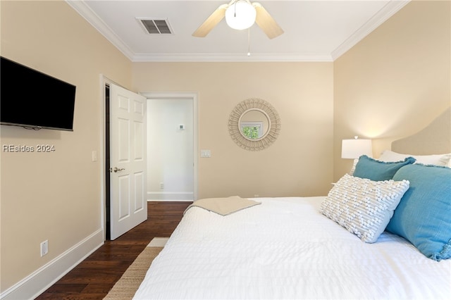 bedroom with dark wood-type flooring, ceiling fan, and ornamental molding