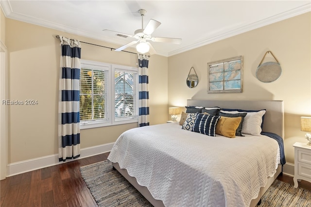 bedroom featuring ceiling fan, ornamental molding, and dark hardwood / wood-style flooring