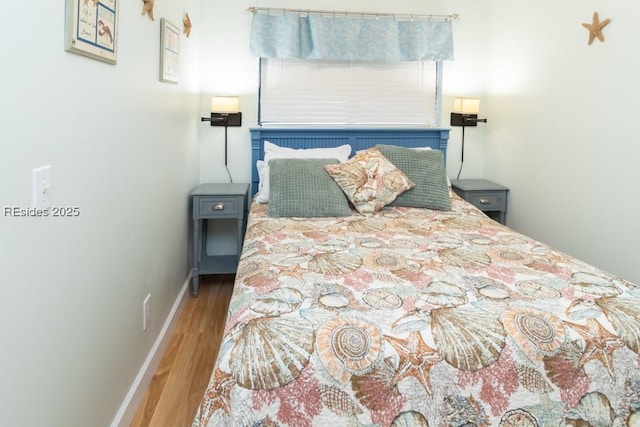 bedroom featuring hardwood / wood-style floors