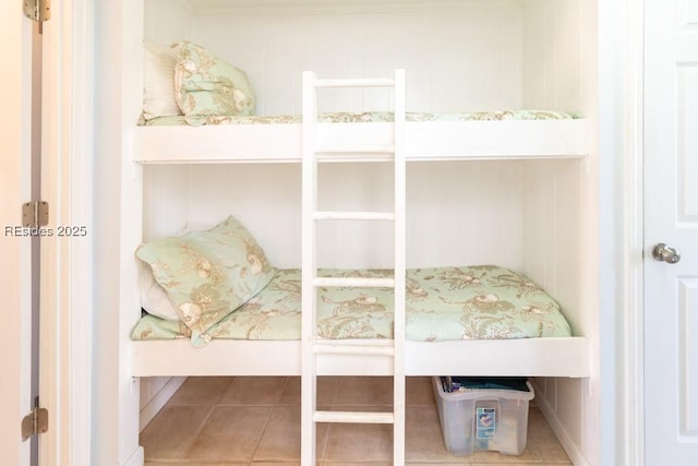 bedroom featuring tile patterned floors