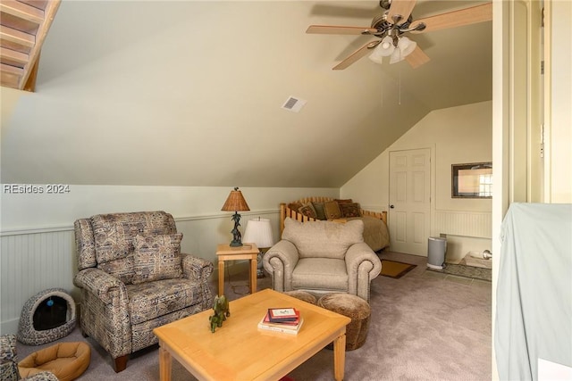 sitting room featuring lofted ceiling, carpet floors, and ceiling fan