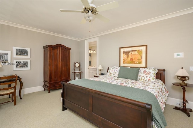 bedroom featuring ensuite bathroom, ornamental molding, light colored carpet, and ceiling fan