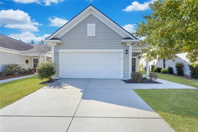 50 Gleneagle Ct, Bluffton, SC 29909 - view of front facade with a garage and a front yard