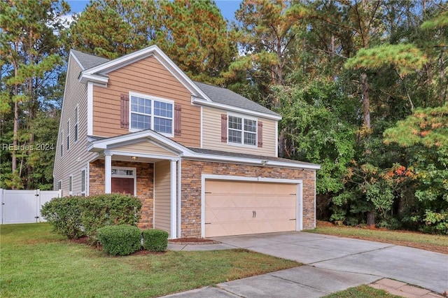 view of front facade featuring a garage and a front lawn