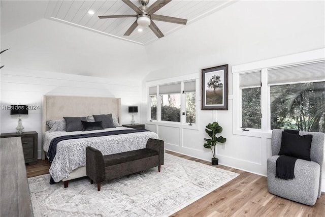 bedroom with wood ceiling, ceiling fan, lofted ceiling, and hardwood / wood-style floors