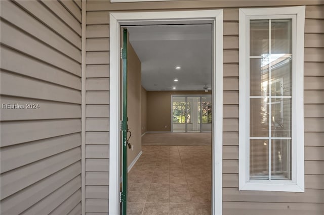 doorway to property with a patio