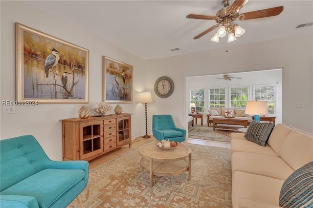 living room with ceiling fan