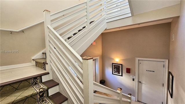 stairs with a high ceiling