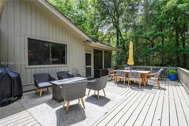 wooden deck with area for grilling