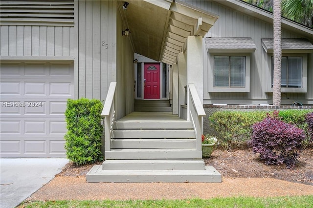 entrance to property featuring a garage