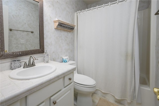 full bathroom featuring vanity, toilet, and shower / bath combo with shower curtain