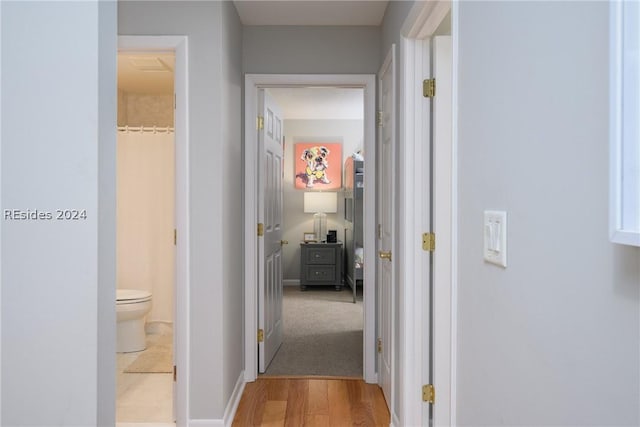 corridor featuring light wood-type flooring