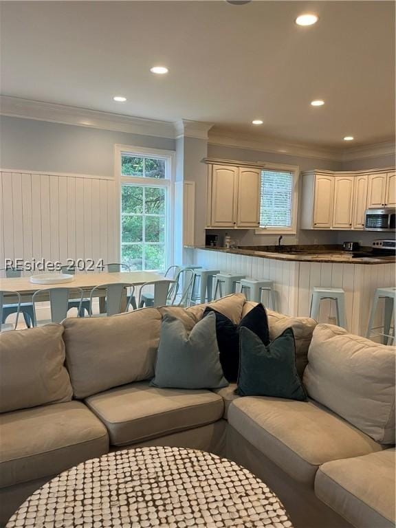 living room featuring ornamental molding