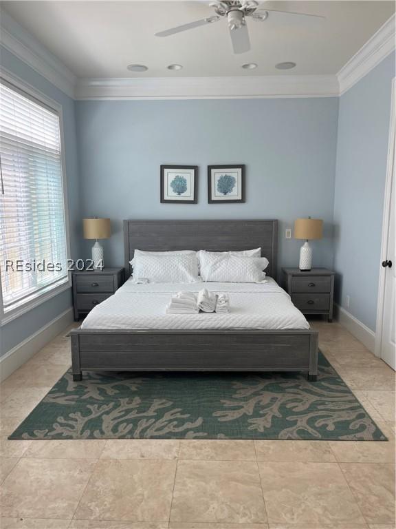 bedroom featuring multiple windows, crown molding, light tile patterned floors, and ceiling fan