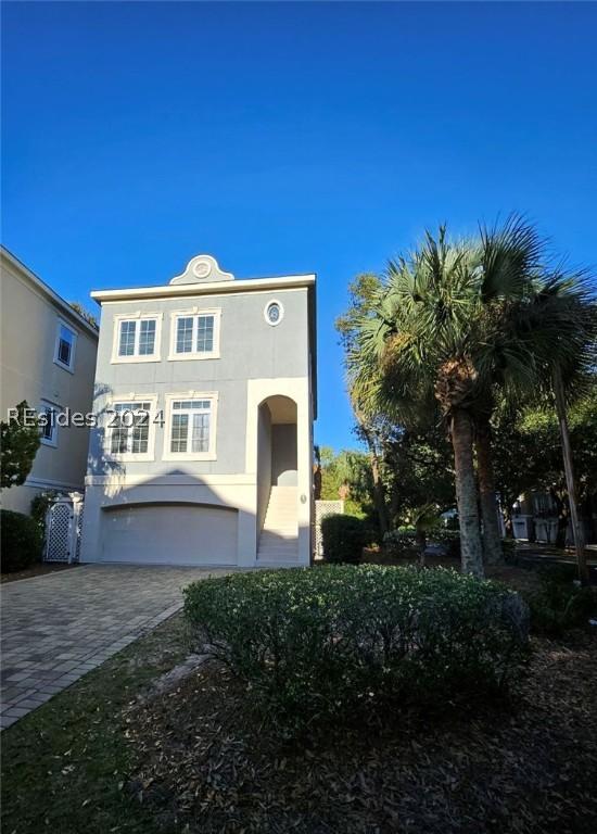 view of front of property with a garage