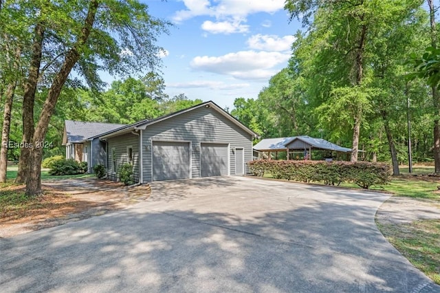 view of property exterior with a garage