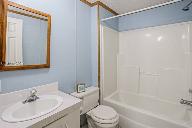 full bathroom with toilet, vanity, bathtub / shower combination, and a textured ceiling