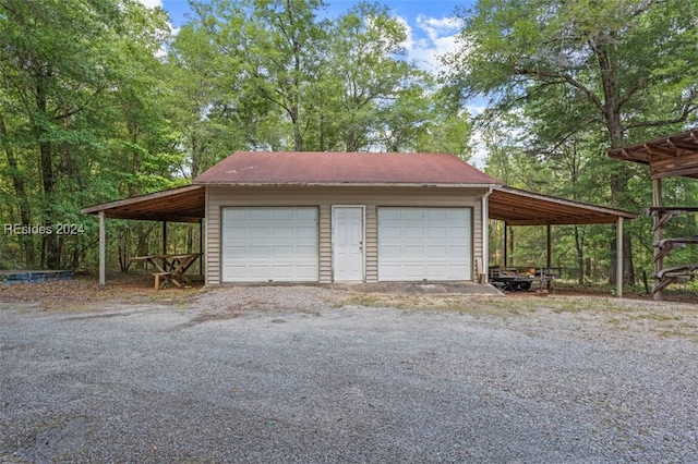 garage with a carport