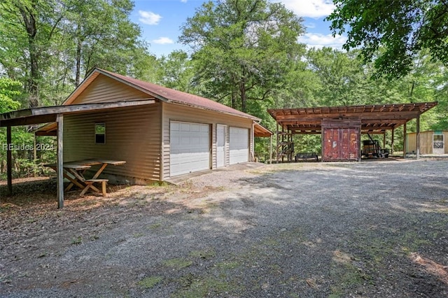 garage featuring a carport