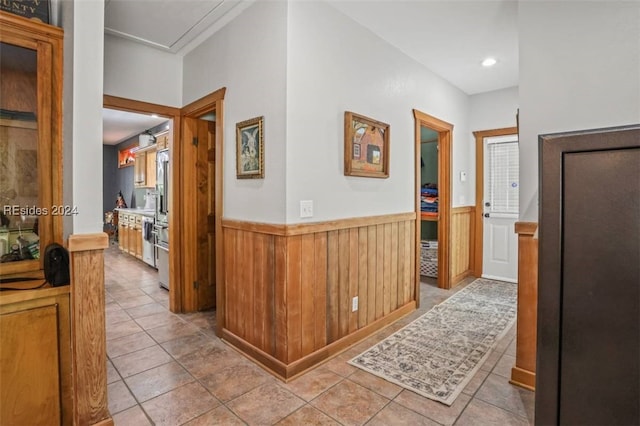 hallway featuring light tile patterned floors