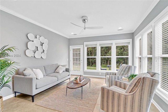 tiled living room with ceiling fan and ornamental molding