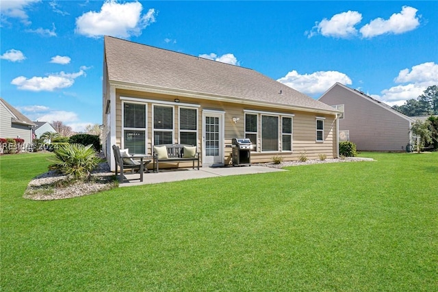 rear view of property featuring an outdoor hangout area, a yard, and a patio area