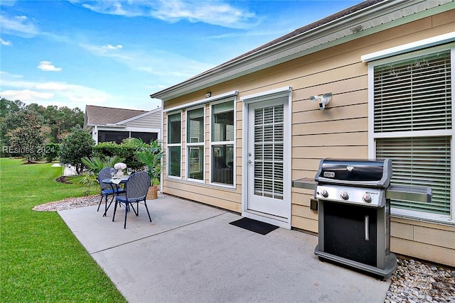 view of patio with a grill