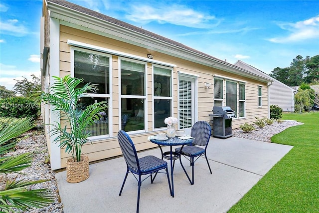 view of patio featuring a grill